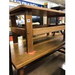 PINE OBLONG COFFEE TABLE AND A PLANK TOP TRESTLE STRETCHER BASE TABLE