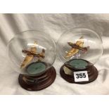 TWO MODELS OF THE SPIT FIRE AND LANCASTER BOMBER IN GLASS GLOBE