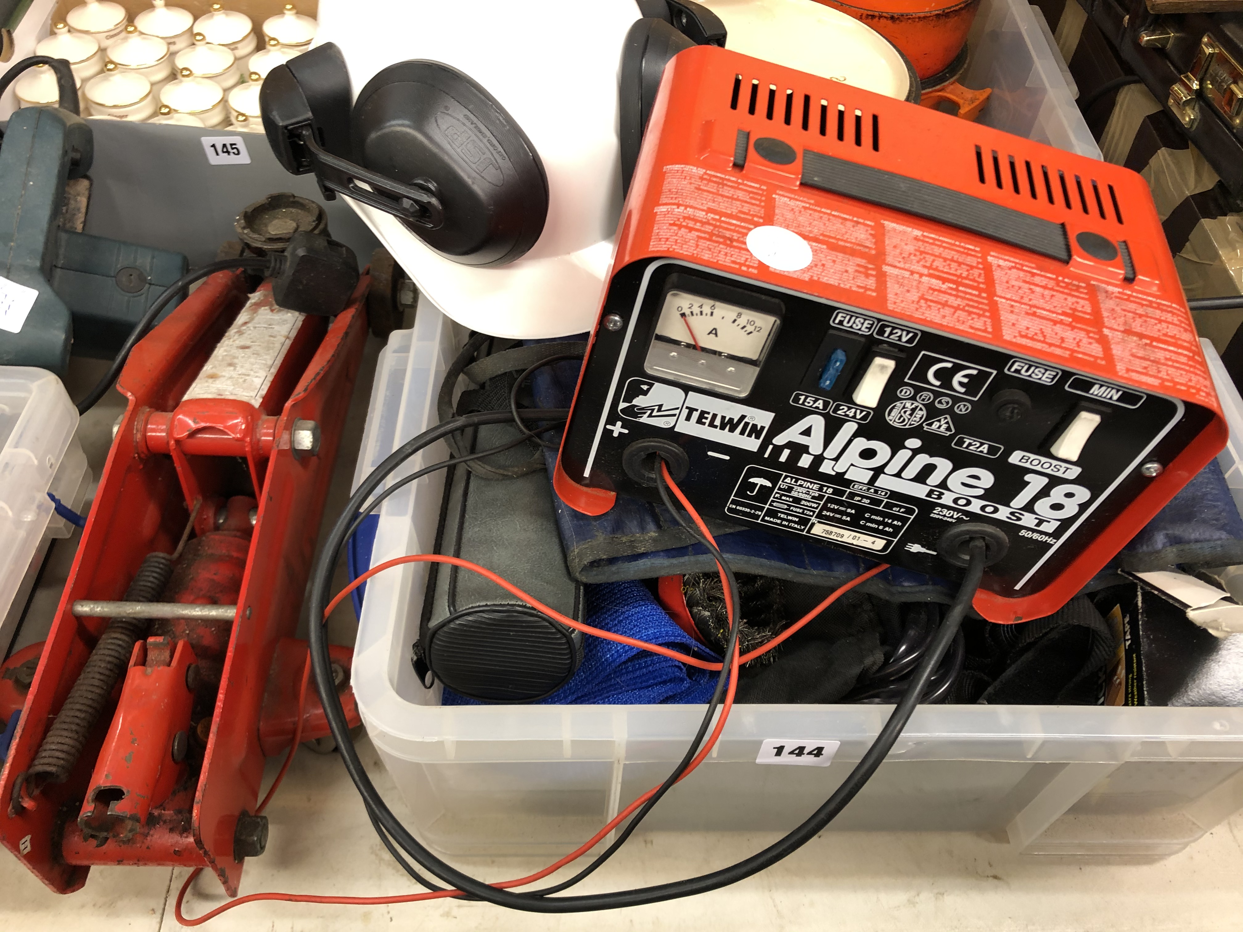 HYDRAULIC TROLLEY JACK, ALPINE BATTERY CHARGER, TUB OF VARIOUS TOOLS, SPANNERS,