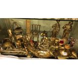 BOTTOM SHELF OF ORNAMENTAL BRASSWARES INCLUDING FIGURES, HORSES,