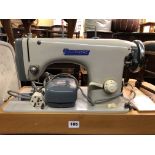 ELECTRIC CASED SEWING MACHINE