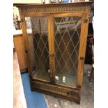 OAK CARVED LEADED GLAZED ILLUMINATED CABINET