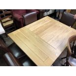CONTEMPORARY OAK SQUARE SECTION DRAWER LEAF TABLE AND FOUR BROWN LEATHER DINING CHAIRS