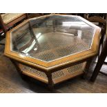 OCTAGONAL GLASS INSET COFFEE TABLE WITH CANED UNDERTIER