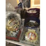 SEVERAL BOXED TINS OF DRESS JEWELLERY, BEADS, MARCASITE,