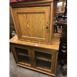 OAK EFFECT LEAD GLAZED MEDIA CABINET AND MATCHING CUPBOARD