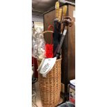 WICKER WORK CANE STAND OF GOLFING TYPE UMBRELLAS AND CANES