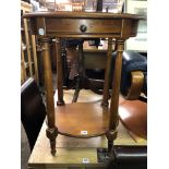 OVAL OCCASIONAL TABLE WITH SHALLOW DRAWER AND UNDERTIER