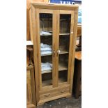 CONTEMPORARY LIGHT OAK GLAZED DOOR TALL CABINET WITH FITTED DRAWER