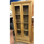 CONTEMPORARY LIGHT OAK GLAZED DOOR TALL CABINET WITH FITTED DRAWER