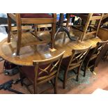 REGENCY MAHOGANY CROSS BANDED EXTENDING DINING TABLE WITH EIGHT CHAIRS