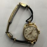 9CT GOLD CASED LADIES DOCKER 17 RUBY WRIST WATCH