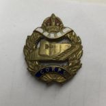 WWI METAL AND ENAMEL TANK CORPS LAPEL BADGE