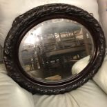 HEAVY CARVED FRAMED OVAL MIRROR