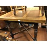 OAK DRAWER LEAF CROSS STRETCHER DINING TABLE AND TWO CHAIRS