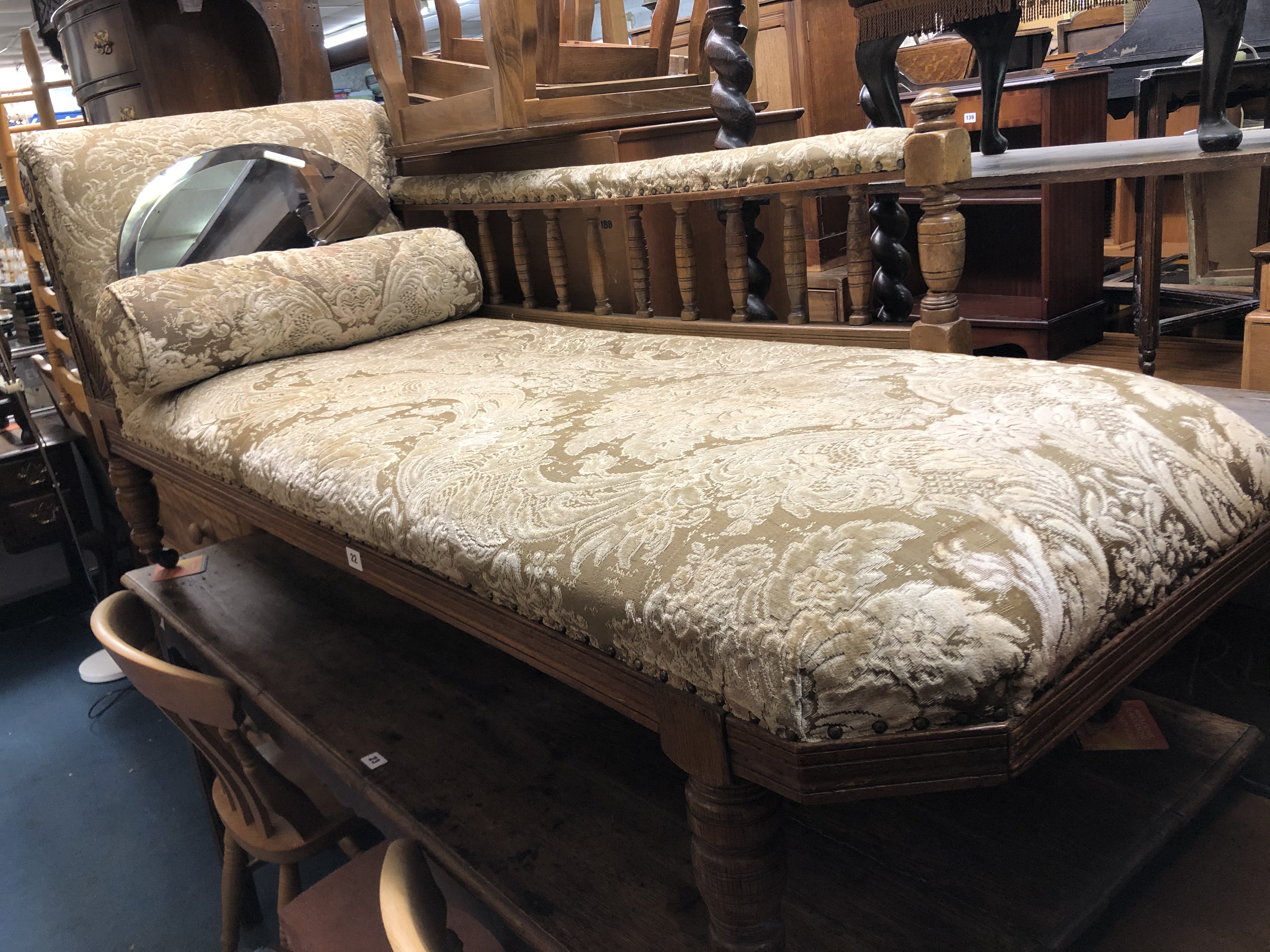 LATE VICTORIAN OAK SHOW FRAME CHAISE LOUNGE WITH BOLSTER CUSHION