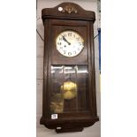 OAK CASED EIGHT DAY PENDULUM WALL CLOCK