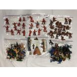 SEVEN BAGS OF WESTERN COWBOYS AND NATIVE AMERICAN INDIAN PLASTIC TOY FIGURES, TEPEES, CANOES, ETC.