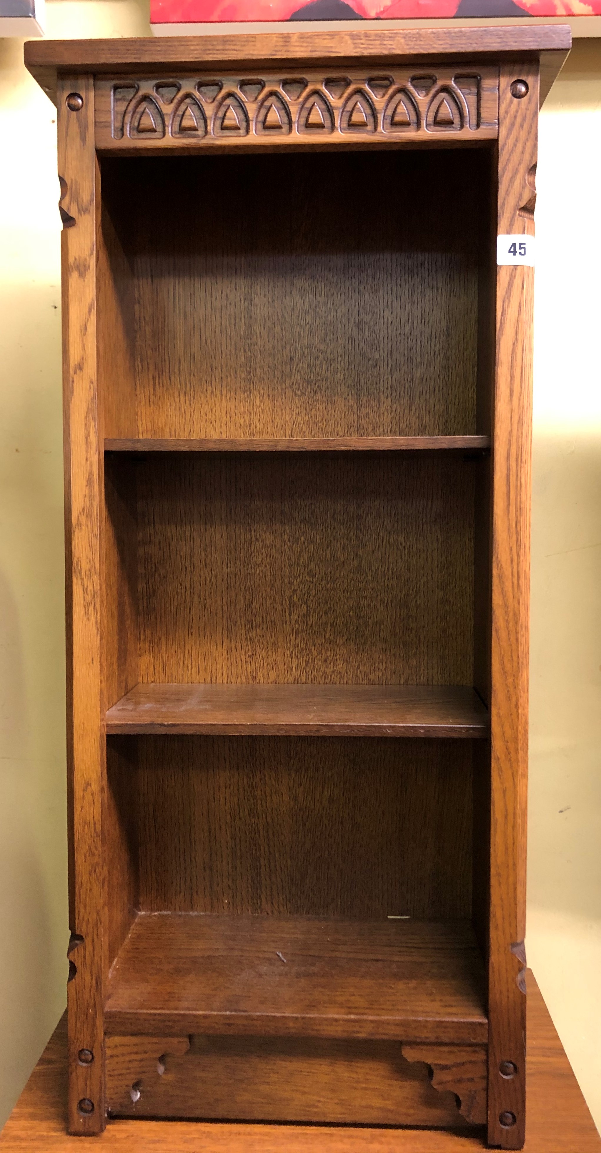 SMALL CARVED OAK BOOKCASE