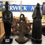 DUTCHMAN AND NUN SPIRIT DECANTERS AND A CAST IRON DOORSTOP