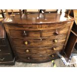 REGENCY MAHOGANY CROSS BANDED AND INLAID BOW FRONT CHEST OF TWO OVER THREE DRAWERS