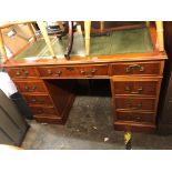 YEW GREEN LEATHER TOPPED NINE DRAWER PEDESTAL DESK