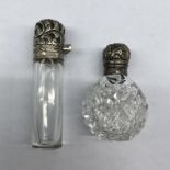 SILVER EMBOSSED CYLINDRICAL SCENT PHIAL AND SMALL SILVER TOPPED SCENT BOTTLE
