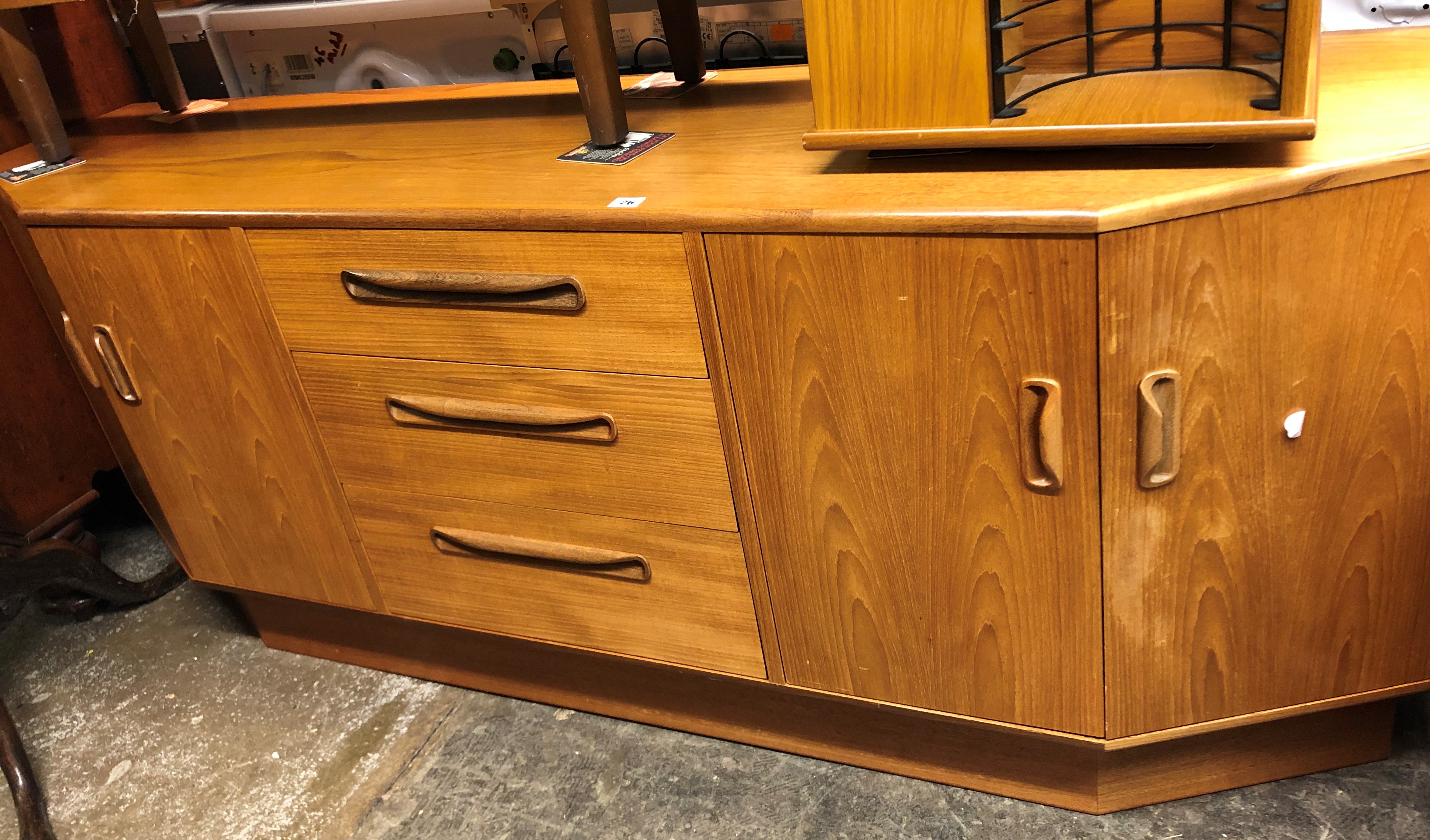 1970S G PLAN TEAK LOW SIDEBOARD WITH CANTED END CUPBOARDS