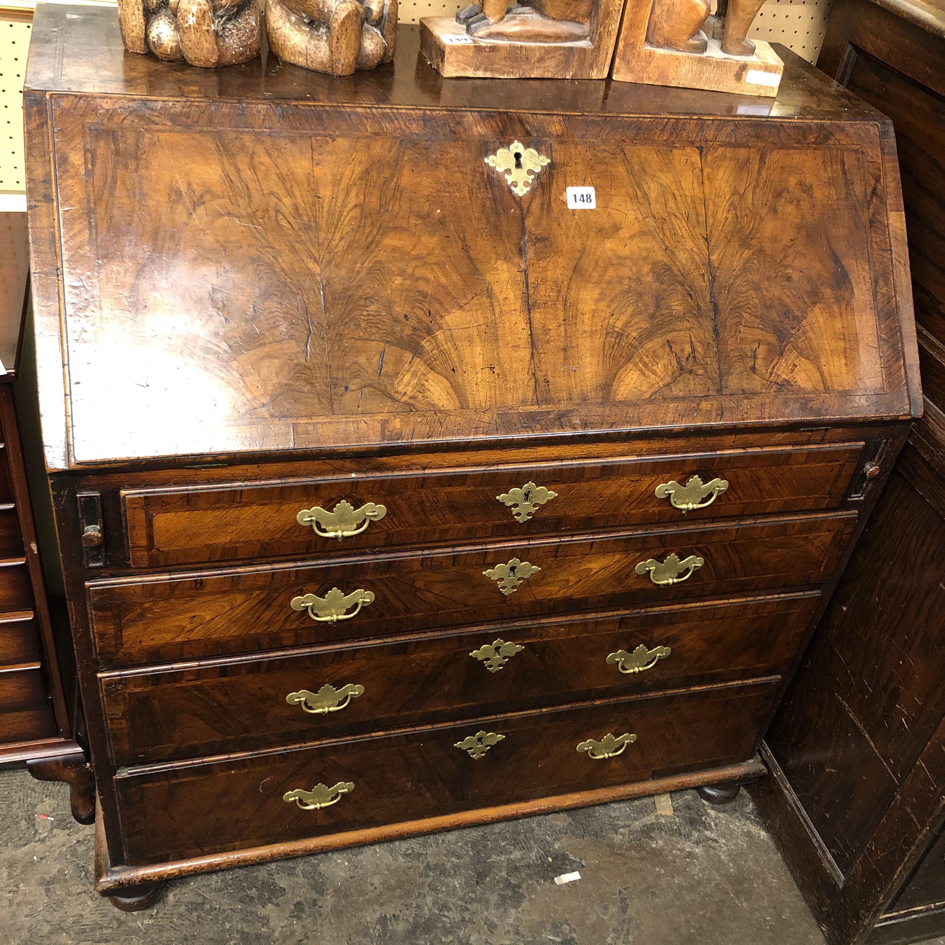 EARLY 18TH CENTURY WALNUT CROSSBANDED BUREAU, THE FALL ENCLOSING CENTRAL CUPBOARD,