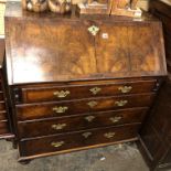 EARLY 18TH CENTURY WALNUT CROSSBANDED BUREAU, THE FALL ENCLOSING CENTRAL CUPBOARD,