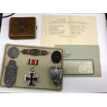 BOARD OF WILHELM DEUMER GERMAN WWII MEDALS ON CARD WITH LEATHER CIGARETTE CASE