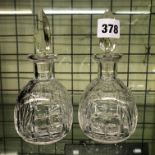 PAIR OF CUT GLASS SCENT BOTTLES WITH FACET STOPPERS