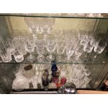 SHELF OF SETS OF CUT GLASSWARE AND SHELF OF MISCELLANEOUS DECORATIVE GLASS