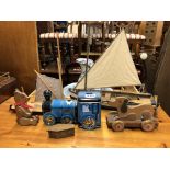 TWO MODEL BOATS, A DOG PULL ALONG TOY,