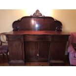 VICTORIAN MAHOGANY INVERTED BREAK FRONT PEDESTAL SIDEBOARD WITH CARVED CRESTED ARCHED BACK