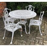 VICTORIAN STYLE CIRCULAR WHITE PAINTED METAL (NOT CAST IRON) GARDEN TABLE AND FOUR CHAIRS