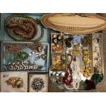 TIN LID OF VARIOUS COSTUME JEWELLERY, BEADS, BROOCHES,