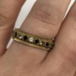 9CT GOLD RUBY AND CZ ETERNITY BAND SIZE Q 3.8G APPROX.