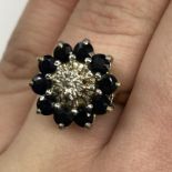 9CT GOLD SAPPHIRE AND DIAMOND CHIP ILLUSION CLUSTER RING SIZE L 4.3G APPROX.