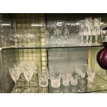 TWO SHELVES OF CUT GLASSWARES