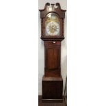 BRASS FACED EIGHT DAY LONG CASE CLOCK WITH APPLIED SPANDRILS, SILVER CHAPTER RING,