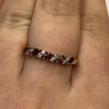 18CT GOLD RUBY AND DIAMOND CHANNEL SET RING SIZE O/P 2.