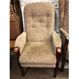 BROWN BUTTON BACK WOODEN FRAMED ARMCHAIR