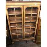 REPRODUCTION QUEEN ANNE STYLE WALNUT GLAZED CABINET ON LOW STAND