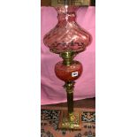 BRASS CORINTHIAN COLUMN OIL LAMP WITH RUBY RESERVOIR AND SHADE