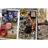 TWO TRAYS OF VARIOUS COSTUME BEADS, POWDER COMPACTS,