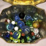 ENAMEL TIN OF VINTAGE GLASS MARBLES