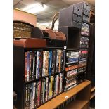 BROWN STITCHED DVD STORAGE RACKS (WITH CONTENTS) AND DESK TIDY