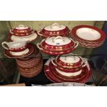 EXTENSIVE 19TH CENTURY CLARET AND GILT DINNER SERVICE INCLUDING PLATTERS AND LARGE TUREENS AND