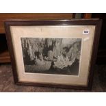 PRINT OF A SEASCAPE AND PHOTOGRAPH OF STALACTITES